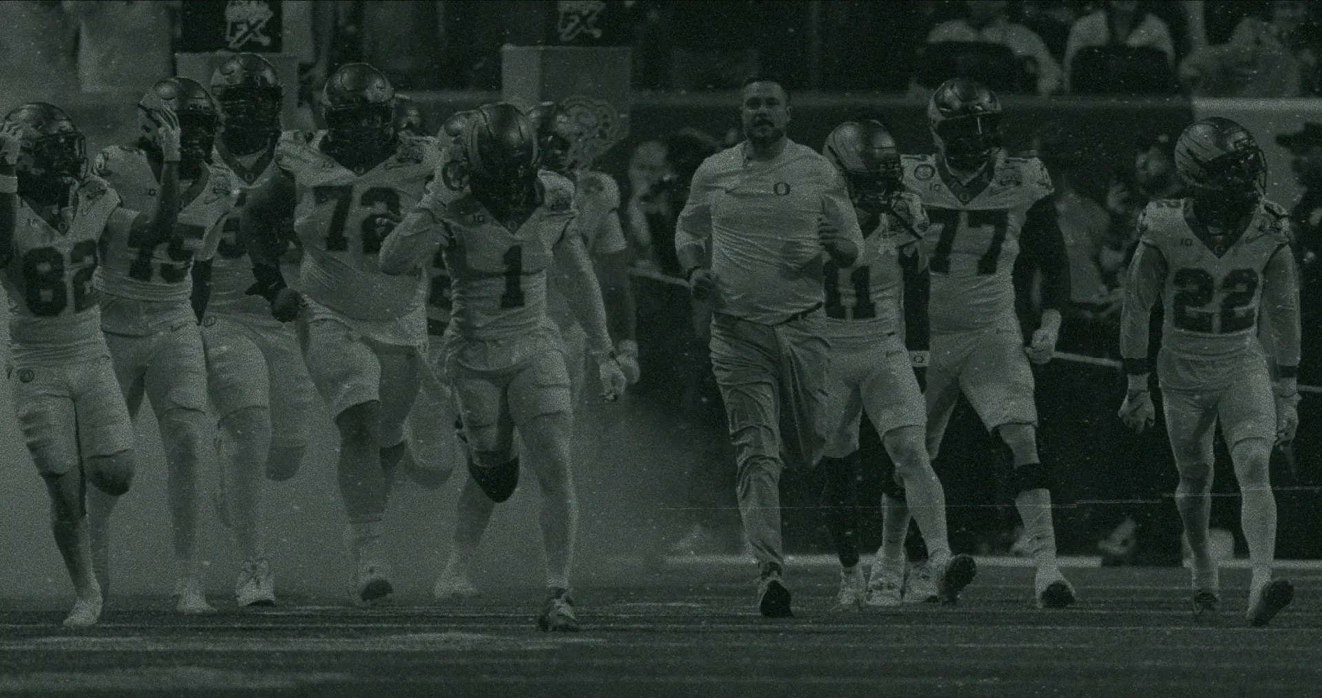 Oregon Ducks players on the field